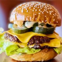 Oh, Gee! · Two all-beef smashed patties, American cheese, fresh bibb lettuce, herby pickles, and top-se...