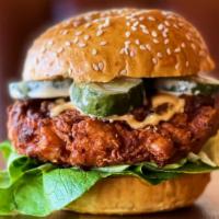 Crispy Gee · Buttermilk brined, organic chicken breast, flash fried with crunchy lettuce, house made pick...