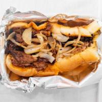 Smoked Brisket Cheesesteak · Serverd with Provolone  Cheese, Fried Onions,  sweet and hot peppers.