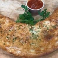 Cheese Calzone · Stuffed with ricotta and mozzarella cheese.