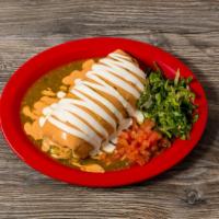 Burritos · All burritos are stuffed with rice and pinto refried beans. They are topped with cheese, let...