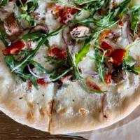 Logan Square · garlic roasted mushrooms, goat cheese crema, provolone, red onion, rosemary, olive tapenade,...