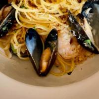 Seafood Linguine · mussels, shrimp, garlic, shallots, white wine, fresh tomato juice, herbed breadcrumbs, butte...