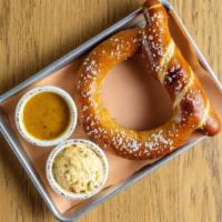 Espco Topknot Pretzel · Local made artisan pretzel, baked to order, brushed with butter and finished with salt. Serv...