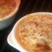 Alan'S French Onion Soup · Euro-style finished with sherry and a gruyere, mozzarella gratin.