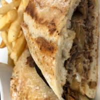 Prime Rib & Swiss French Dip · Thinly sliced with sautéed onions and melted swiss cheese on crusty bread au jus served with...