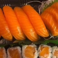 Salmon Lover · 3 pcs sashimi 5 pcs sushi 1 salmon roll