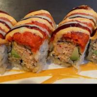 Landscape Roll · Spicy snow crab, avocado inside, topped with spicy tuna, spicy salmon and spicy yellowtail s...