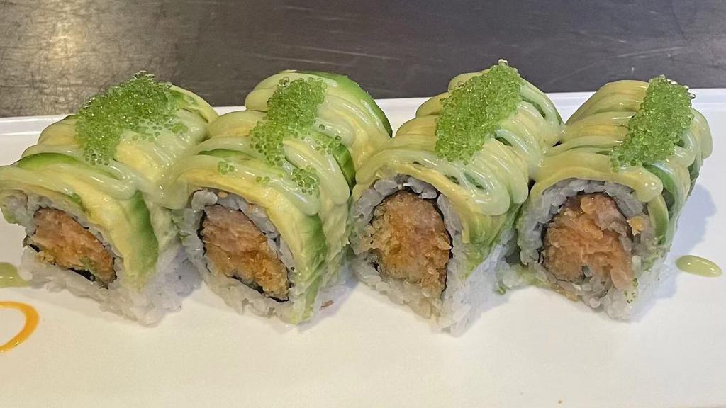 Ninja Turtle Roll · Spicy white tuna, spicy yellowtail and tempura flakes inside, avocado, wasabi tobiko on top with honey wasabi sauce.
