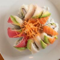 Rainbow Roll · Crabmeat, cucumber inside, top with tuna, salmon, white tuna and avocado.