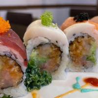 Out Of Control Roll · Spicy yellowtail and avocado inside with salmon,yellowtail,tuna,white tuna.served colorful t...