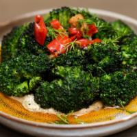 Grilled Broccoli · Roasted Garlic, chili oil, and charred broccoli tahina.