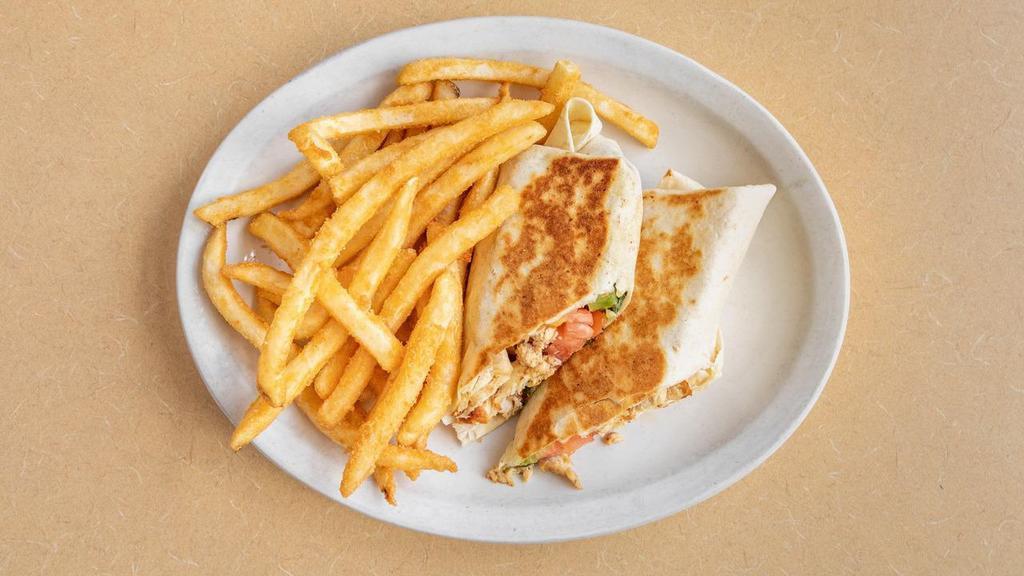 Chicken Caesar Salad Wrap · Grilled chicken with lettuce, tomato and Caesar dressing.