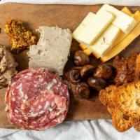 Charcuterie Board · Assorted house made cured meats, pickles, cheese, whole grain mustard, fruit jam and crostini