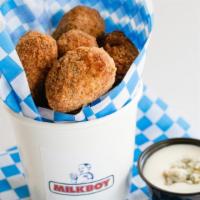Buffalo Chicken Poppers · Think of a scoop of Buffalo Chicken Dip breaded and fried!!!  

Side of Blue Cheese