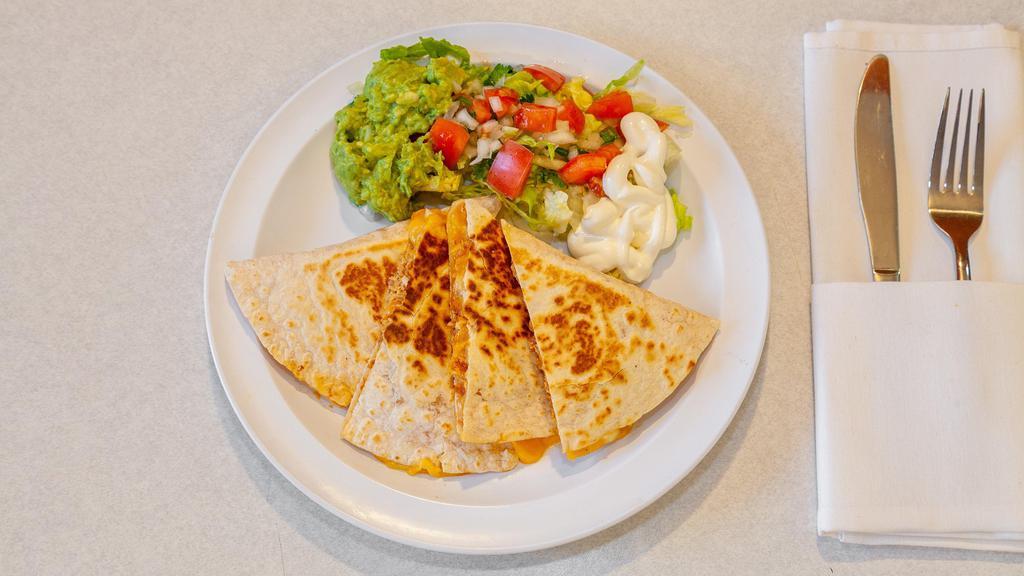 Cheese Quesadilla · Vegetarian. In Flour Tortilla Served With Lettuce, Pico De Gallo, Sour Cream & Guacamole. Add cheese, avocado, sour cream guacamole for an additional charge.