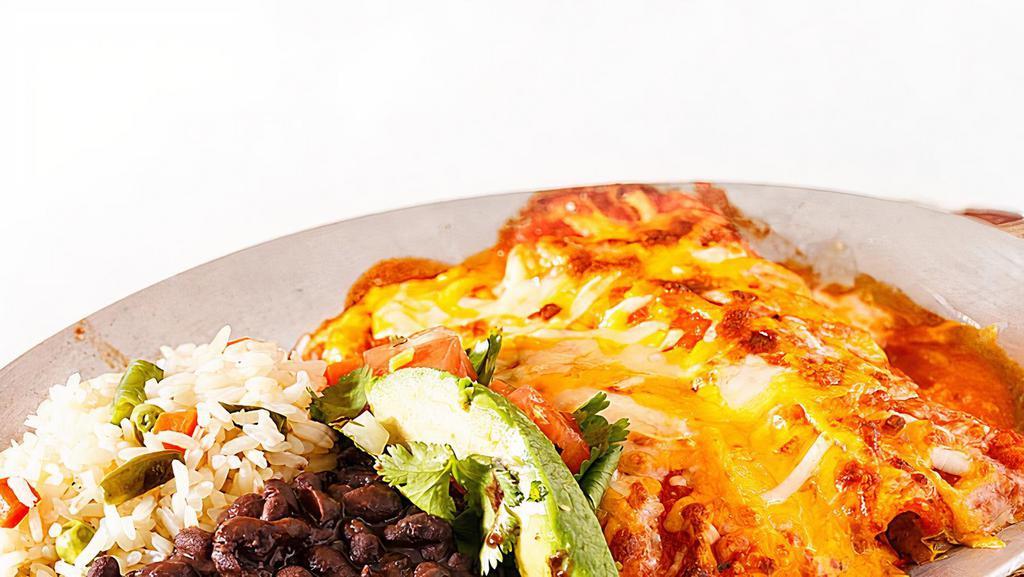 Enchiladas · Vegetarian. Your Choice of Protein Wrapped in Two Corn Tortillas, Topped with Ranchera Salsa & Melted Cheese with Side of Rice and Beans.