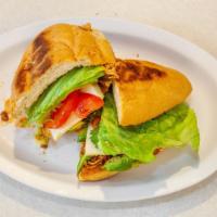 Tortas · Your choice of protein served with refried beans,  lettuce, tomato, onions, avocados,  white...