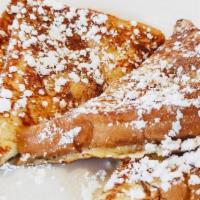 French Toast · With whipped butter and maple syrup.