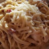 Carbonara · A rich sauce of pancetta, heavy cream, black pepper, egg and parmesan cheese