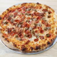 Meat Lovers Pie · california tomato sauce, mozzarella, pepperoni, meatballs, sausage, bacon