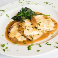 Vitello Saltimbocca · Veal medallions topped with prosciutto and fresh mozzarella in a sage white wine sauce over ...