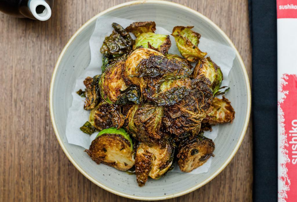 Crispy Brussel Sprouts · Flash fried brussels sprouts • spicy soy caramel
