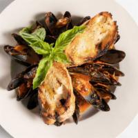Impepata Di Cozze · Mussels in red or white sauce.