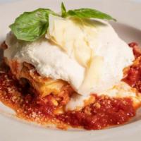 Lasagne Bolognese · With meat sauce, mozzarella, parmigiano, ricotta with tomato sauce.