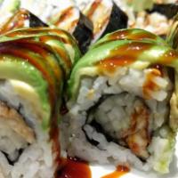 Dragon Roll · Shrimp, tempura inside, sliced avocado & eel sauce on top.