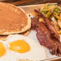 Breakfast Platter · Two Eggs Cooked Your Way, Two Pancakes, Applewood Smoked Bacon, Maple Pork Sausage, and Home...