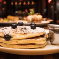 Stacked Pancakes · 4 Buttermilk Pancakes served with Your Choice of Topping, Butter, Powdered Sugar, and Maple ...