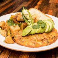 Mexican Omelette · Served with Home Fries and Toast.  Omelette stuffed with Tomato, Bell Peppers, Jalapeno, Bla...