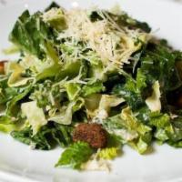 Caesar Salad · Topped with Croutons, Parmesan Cheese, and Classic Caesar Dressing.