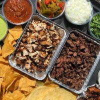 Taco Platter · Serves 3-4. Everything you need to build-your-own Tacos. Includes Flour Tortillas, Grilled C...