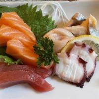 Sashimi · Assortment of raw fish.