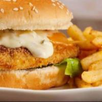 Fish Sandwich · With french fries and can of soda.