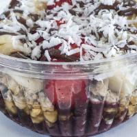 Chocotella Acai Bowl · Acai Base, Granola, Banana, Strawberry, Pineapple, Honey, Nutella, Coconut flakes