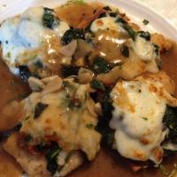 Chicken Saltimbocca · Lightly sautéed in seasoned flour topped with prosciutto, sautéed spinach, dusted with sage,...