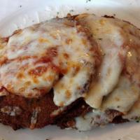 Veal Romano · Eggplant layered with veal served in a light marinara and topped with buffalo mozzarella.