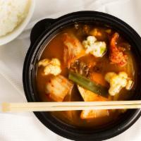 Kimchi Soup · Beef broth with kimchi and vegetables.