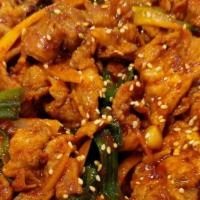 Spicy Pork Gui · Marinated spicy pork, includes lettuce wrap, soybean paste, garlic, and pepper.