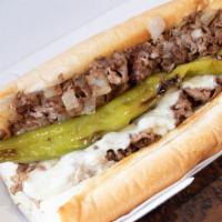 Long Hot Cheesesteak · Hand cut Ribeye with cooked with long hots and pickle juice with your choice of cheese. With...