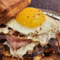 Brunch Patty Melt · Maple bacon, Rineer Farms Blackberry Jam, Sunny Egg, American cheese, beef patty, griddled b...