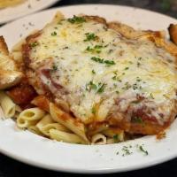 Chicken Parmesan · Breaded chicken with red sauce and melted cheese.