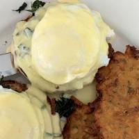 Benedict Florentine · Poached eggs on an English muffin with spinach and Canadian bacon, topped with hollandaise s...