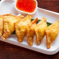 Rangoon · Deep fried dumpling featuring crabmeat, cream cheese.