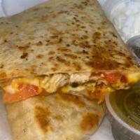 Chicken Quesadilla · With tomatoes & onions.