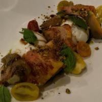 Burrata Caprese · Burrata and Heirloom Tomatoes with Basil Pesto and Aged Balsamic