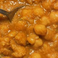 Channa Masala · Vegan, gluten free, vegetarian. Chickpeas cooked in Indian spices and gravy.
